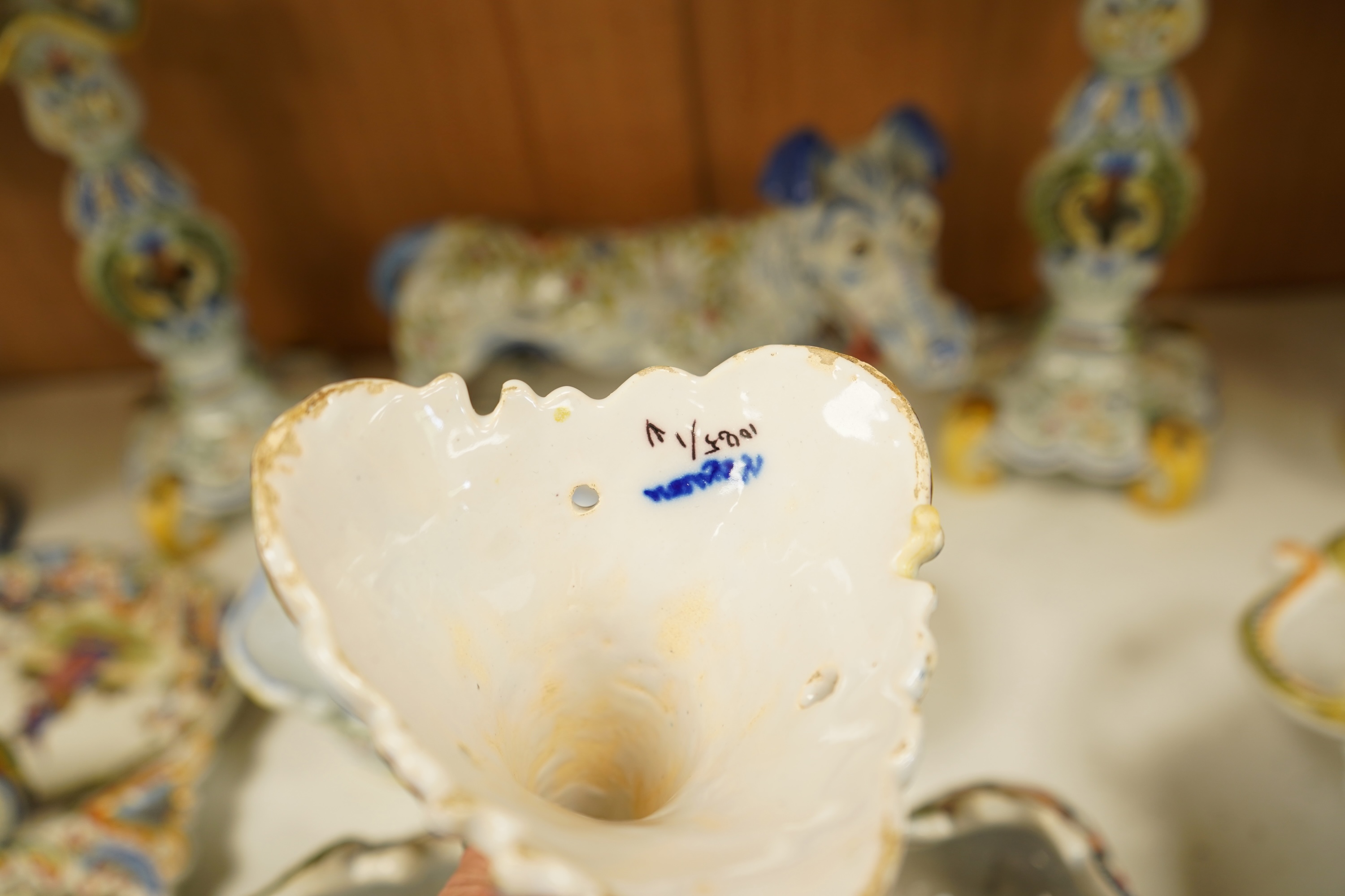 A collection of early 20th century French faience pieces To include dishes, an inkwell and a large ewer, 42cm high